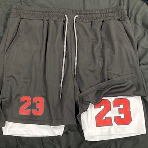 Men's Black Athletic Shorts with Red and White Details